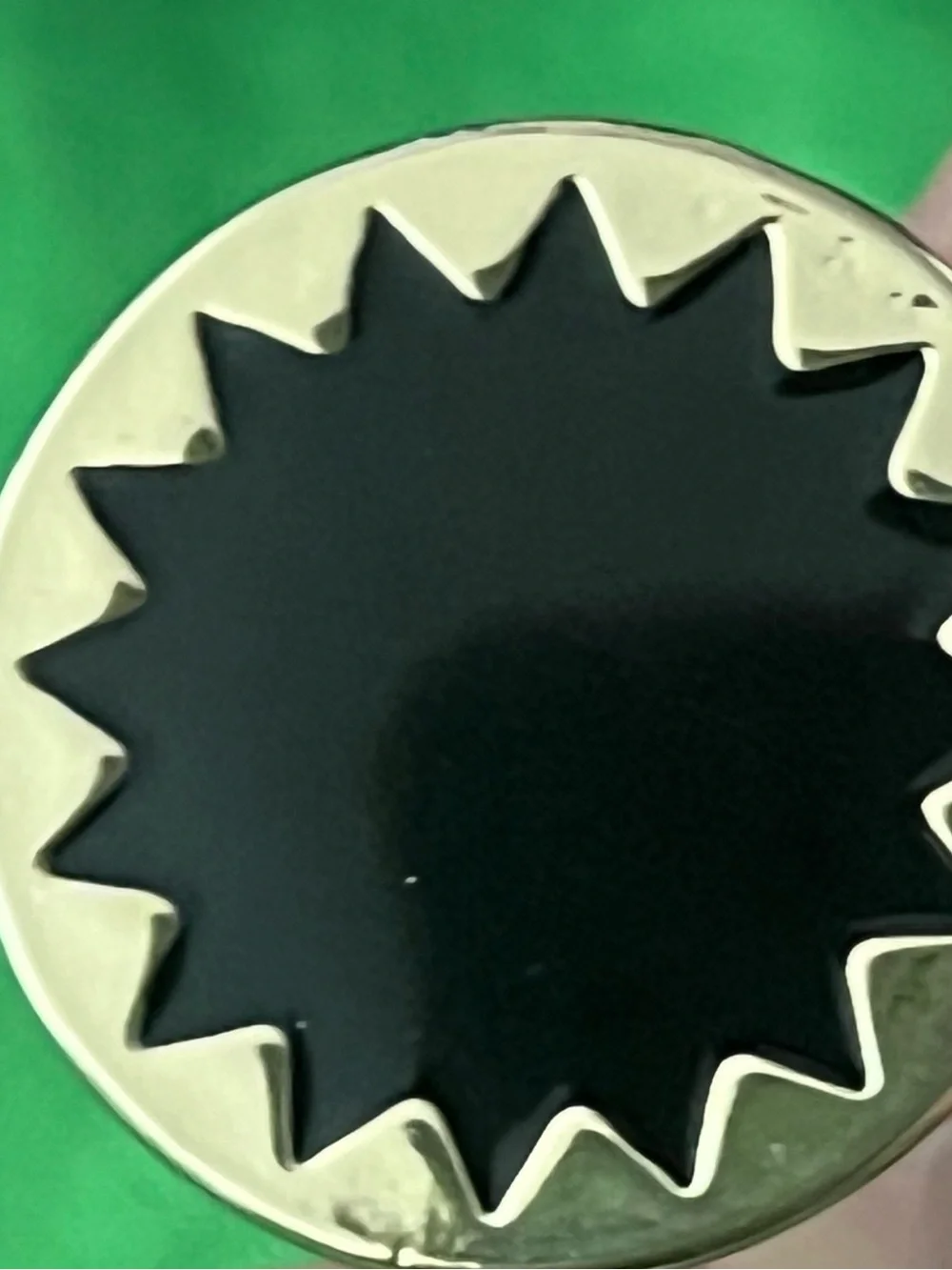 Gold Ring with Black Starburst Inlay